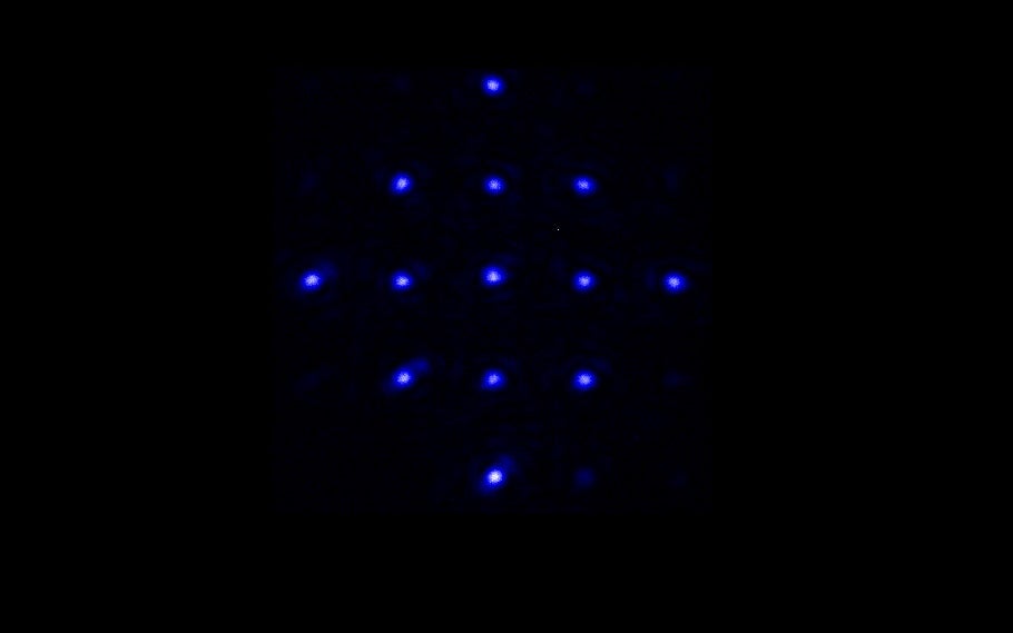 image of small blue dots on black background
